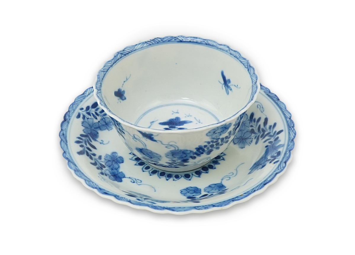 A Chinese blue and white tea bowl and saucer, Kangxi period